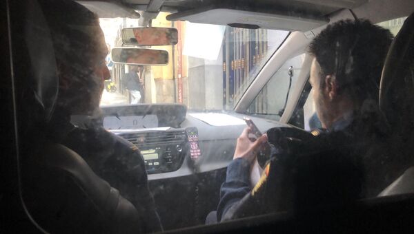 Фотография, сделанная Уильямом Браудером в полицейской машине после задержания в Испании