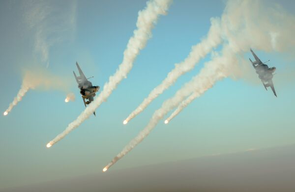 Самолеты сил коалиции F-15E во время операции Непоколебимая решимость Самолеты сил коалиции F-15E во время операции Непоколебимая решимость