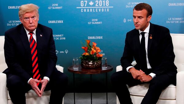 Президент США Дональд Трамп и президент Франции Эммануэль Макрон во время саммита G7 в Квебеке. 8 июня 2018
