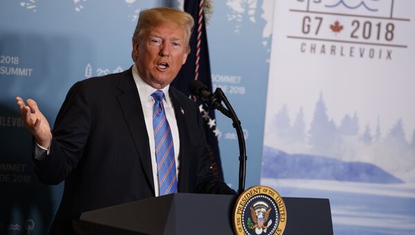 Президент США Дональд Трамп во время пресс-конференции на саммите G7. 9 июня 2018