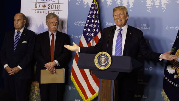 Президент США Дональд Трамп во время пресс-конференции на саммите G7. 9 июня 2018