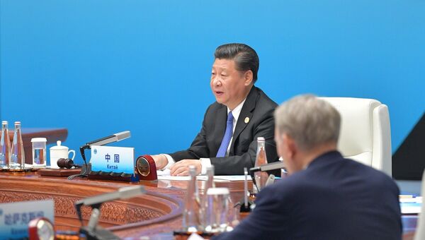 Председатель КНР Си Цзиньпин на заседании Совета глав государств - членов ШОС в расширенном составе в Циндао. 10 июня 2018