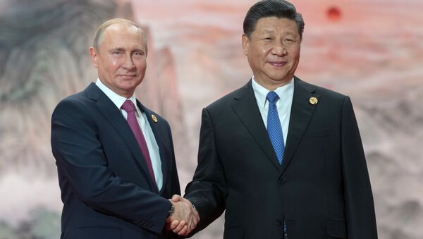 Владимир Путин и председатель КНР Си Цзиньпин перед заседанием Совета ШОС. 10 июня 2018