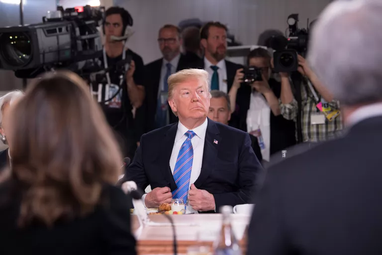 Президент США Дональд Трамп на саммите G7. 9 июня 2018 Президент США Дональд Трамп на саммите G7. 9 июня 2018