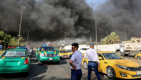 Пожар на складе, на котором хранятся бюллетени для голосования на прошедших в стране парламентских выборах в Багдаде. Архивное фото