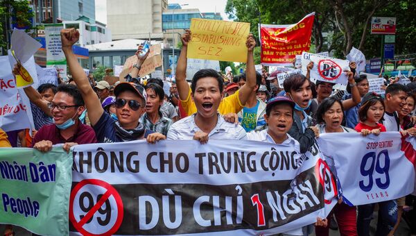 Участники акции протеста в Хошимине, Вьетнам. 10 июня 2018