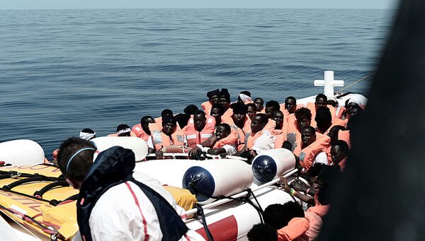 Мигранты, спасенные судном Aquarius в Средиземном море. 12 июня 2018