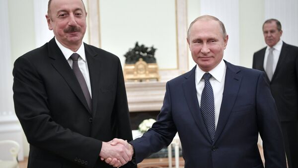 Владимир Путин и президент Азербайджана Ильхам Алиев во время встречи. 13 июня 2018