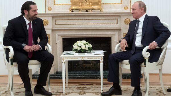 Владимир Путин и премьер-министр Ливана Саад Харири во время встречи. 13 июня 2018