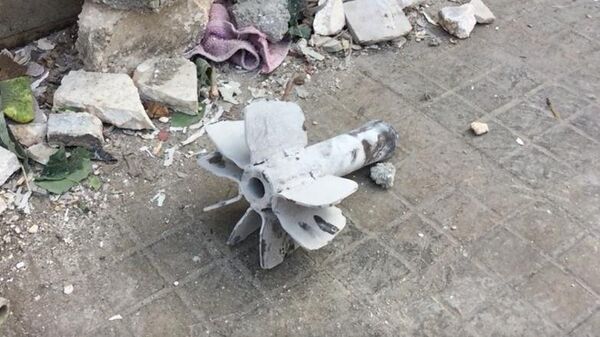 Последствия минометного обстрела жилого района города Алеппо. Архивное фото
