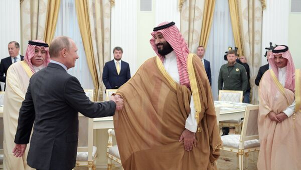 Владимир Путин и наследный принц Саудовской Аравии Мухаммед ибн Салман Аль Сауд во время встречи. 14 июня 2018