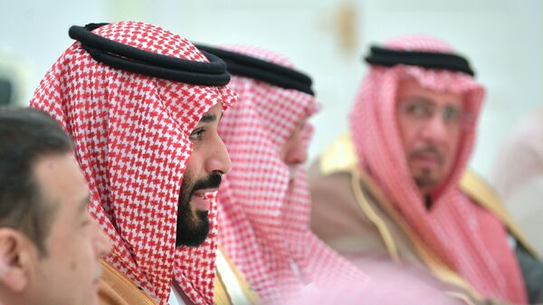 Наследный принц Саудовской Аравии Мухаммед ибн Салман Аль Сауд во время встречи с президентом России Владимиром Путиным. 14 июня 2018