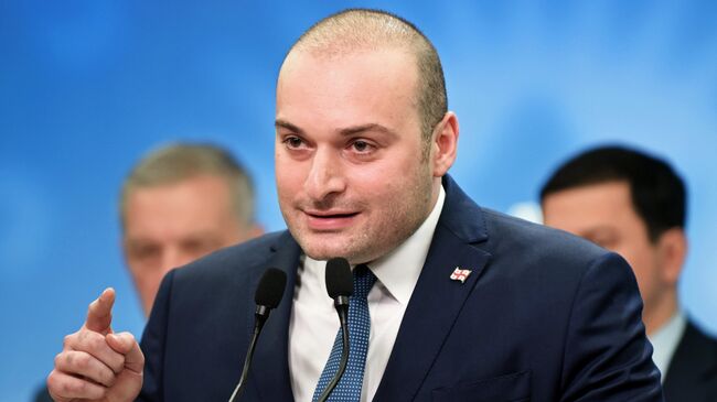 ИО министра финансов Грузии Мамука Бахтадзе, выдвинутый парламентским большинством кандидатом на пост премьер-министра Грузии, на пресс-конференции в Тбилиси. 15 июня 2018
