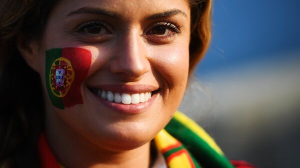 Болельщица сборной Португалии перед матчем группового этапа чемпионата мира по футболу между сборными Португалии и Испании