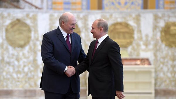 Президент РФ Владимир Путин и президент Белоруссии Александр Лукашенко во время встречи в Минске. 19 июня 2018
