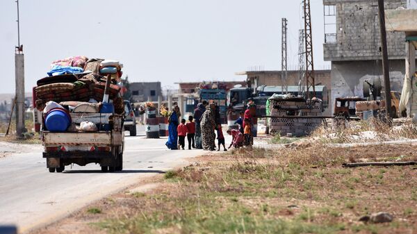 Мирные жители возвращаются в свои дома в Сирии. Архивное фото