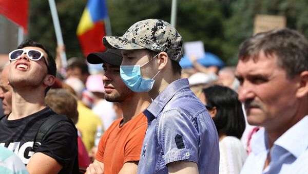 Участники акции протеста в Кишиневе, Молдавия. 24 июня 2018