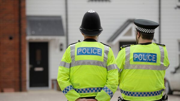 Полицейские в британском Эймсбери после госпитализации двух человек из-за отравления. 4 июля 2018