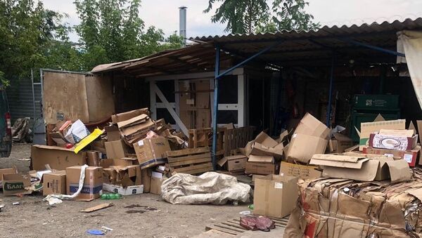 Последствие взрыва гранаты, найденной в макулатуре, на одной из баз в Ворошиловском районе города Ростова-на-Дону. 6 июля 2018