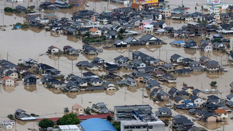 Последствия ливневых дождей в Курасиках, префектура Окаяма, Японии. 8 июля 2018 года