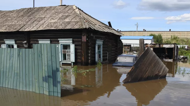 Частный дом, затопленный в результате паводка
