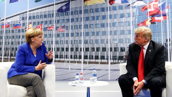 Президент США Дональд Трамп и канцлер Германии Ангела Меркель в двусторонней встрече во время саммита НАТО в Брюсселе, Бельгия. 11 июля 2018