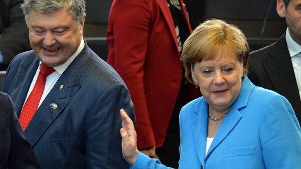 Президент Украины Петр Порошенко и федеральный канцлер ФРГ Ангела Меркель. Архивное фото