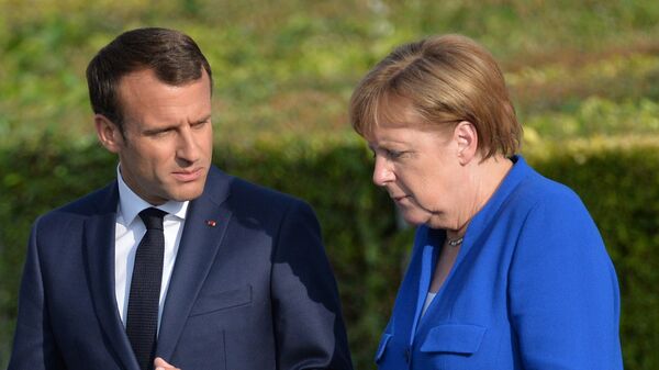 Эммануэль Макрон и Ангела Меркель на саммите НАТО в Брюсселе