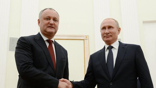 Президент РФ Владимир Путин и президент Молдавии Игорь Додон во время встречи