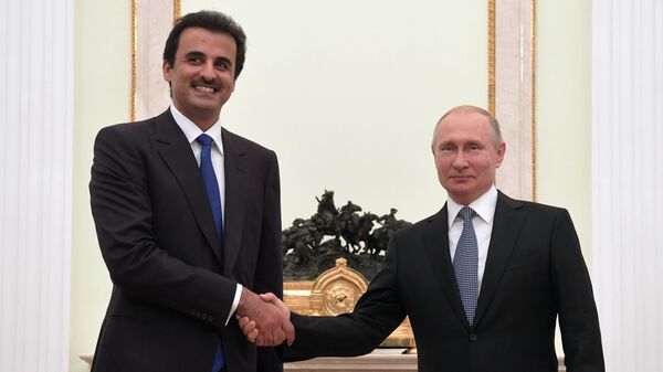  Президент РФ Владимир Путин и эмир государства Катар шейх Тамим бен Хамад Аль Тани во время встречи. 15 июля 2018