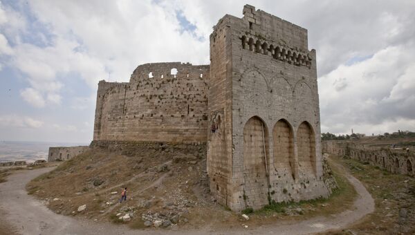 Крепость Крак де Шевалье, расположенная в 65 километрах восточнее города Хомса. Архивное фото