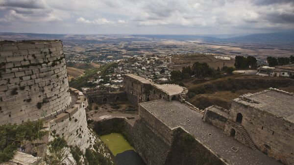 Замок крестоносцев Крак де Шевалье, расположенный в 65 километрах восточнее города Хомса
