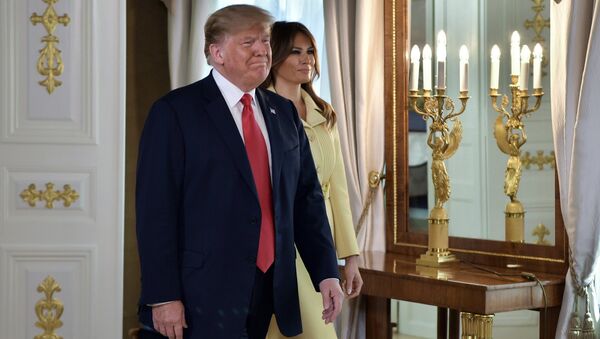Президент США Дональд Трамп с супругой Меланьей во время встречи с президентом РФ Владимиром Путиным в президентском дворце в Хельсинки. 16 июля 2018