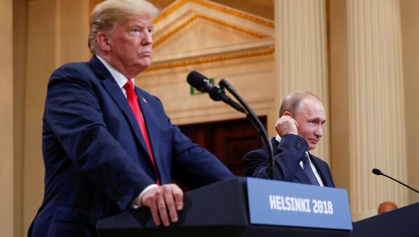 Президент РФ Владимир Путин и президент США Дональд Трамп во время пресс-конференции в Хельсинки. 16 июля 2018