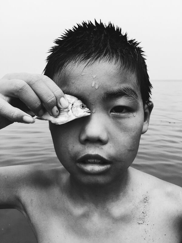 Работа фотографа Huapeng Zhao, завоевавшая второе место и звание Фотограф года в фотоконкурсе 2018 iPhone Photography Awards