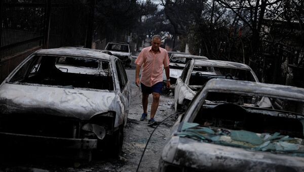 Последствия пожара в деревне Мати в Греции. 24 июля 2018