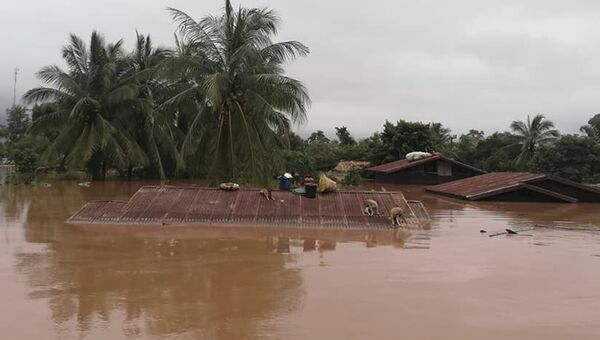 Последствия прорыва плотины ГЭС в провинции Аттапы на юге Лаоса. 24 июля 2018