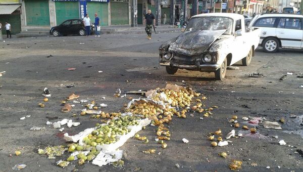 Последствия взрыва в сирийском городе Эс-Сувейда