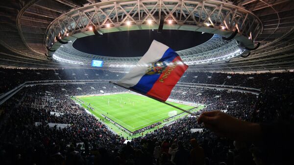 Флаг России на трибуне стадиона Лужники в Москве