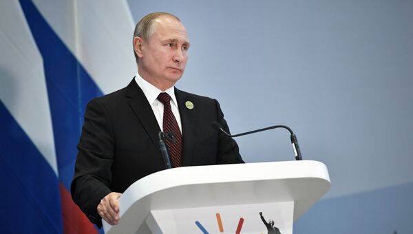 Президент РФ Владимир Путин во время пресс-конференции по итогам саммита лидеров БРИКС в Йоханнесбурге. 27 июля 2018