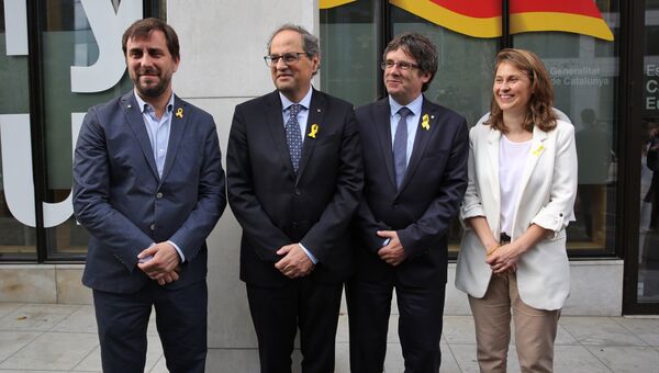 Президент Женералитета Каталонии Ким Торра и экс-глава женералитета Каталонии Карлес Пучдемон. 28 июля 2018