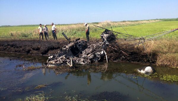 На месте крушения вертолета Ми-2 в Краснодарском крае, в результате которого погибли два человека. 2 августа 2018