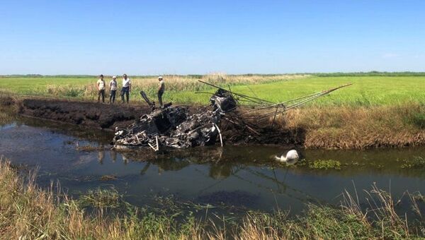 На месте крушения вертолета Ми-2 в Краснодарском крае, в результате которого погибли два человека. 2 августа 2018