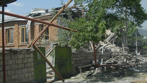 Разрушения в городе Цхинвал после нападения грузинских войск. 11 августа 2008 года