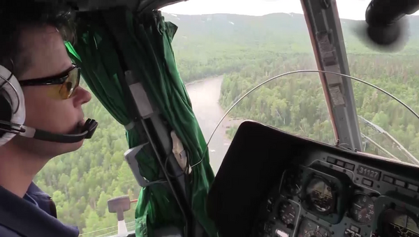 Вертолёт МЧС России вылетел в горы Алтая для эвакуации туристов. 14 августа 2018