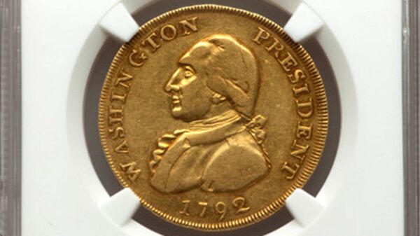 Золотая монета 1792 года выпуска с изображением первого президента США Джорджа Вашингтона