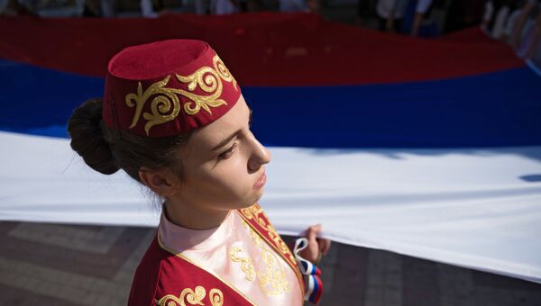 Участница  праздничных мероприятий, приуроченных к Дню Государственного флага Российской Федерации в Симферополе