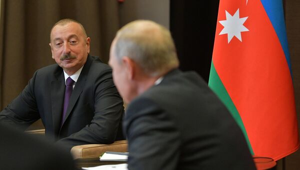 Президент РФ Владимир Путин и президент Азербайджана Ильхам Алиев во время встречи. 1 сентября 2018