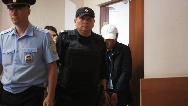 Обвиняемый в убийстве полицейского на станции метро Курская в Москве Нурлан Мурлатов на заседании Черемушкинского районного суда Москвы. 5 сентября 2018