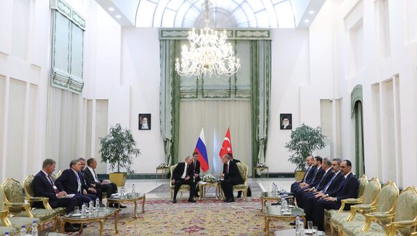 Президент РФ Владимир Путин и президент Турции Реджеп Тайип Эрдоган во время встречи в Тегеране. 7 сентября 2018